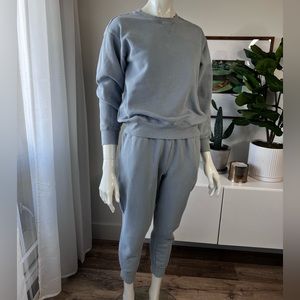 Aritzia TNA matching sweater & sweatpants set.